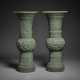 A RARE AND SUPERB PAIR OF FINELY CARVED GREEN JADE GU-FORM VASES - фото 1