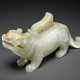 A PALE GREYISH-WHITE JADE FELINE-FORM VESSEL AND COVER - photo 1