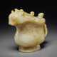 A RARE PALE BEIGE AND RUSSET JADE ARCHAISTIC GONG-FORM VESSEL AND COVER - photo 1