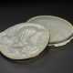 A SMALL WHITE JADE FLATTENED PEBBLE-SHAPED `ELEPHANT’ BOX AND COVER - photo 1