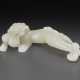 A PALE BEIGEISH-WHITE JADE FIGURE OF A STRIDING CHILONG - photo 1