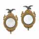 A PAIR OF REGENCY GILTWOOD AND EBONISED CONVEX MIRRORS - photo 1