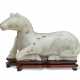 A GREYISH-WHITE JADE FIGURE OF A RECUMBENT HORSE - photo 1