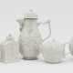 A coffee pot, teapot, tea caddy and two cups with saucers - фото 1