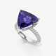 A ring with a tanzanite and brilliant cut diamonds - фото 1
