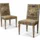 A PAIR OF SOUTH ITALIAN GILT-LEAD AND REVERSE-PAINTED GLASS-MOUNTED GILTWOOD CHAIRS - фото 1