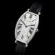 CARTIER. A PLATINUM TONNEAU-SHAPED WRISTWATCH - photo 1