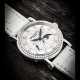 PATEK PHILIPPE. A LADY’S 18K WHITE GOLD AND DIAMOND-SET WRISTWATCH WITH MOON PHASES - Foto 1