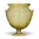 A ROMAN GREEN GLASS FOOTED KANTHAROS - photo 1