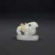 A CARVED WHITE JADE ‘MYTHICAL BIRD’ FINIAL - photo 1