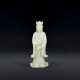 A PALE GREENISH-WHITE JADE CARVING OF A BODHISATTVA - фото 1