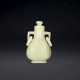 A SMALL YELLOW JADE VASE AND COVER - photo 1