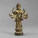 Feuervergoldete Bronzefigur des stehenden achtarmigen Maitreya mit Attributen auf einem hohen Lotossockel - photo 1