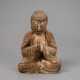 Figur des Buddha aus Holz mit Resten von Fassung - photo 1
