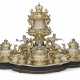 AN IMPORTANT PARCEL-GILT SILVER AND ENAMEL SIX-PIECE TEA SERVICE ON FITTED STAND - фото 1