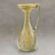 A LATE ROMAN PALE GREEN GLASS JUG - фото 1