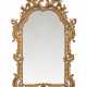 A NORTH EUROPEAN CARVED GILTWOOD MIRROR - Foto 1