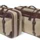 A PAIR OF BROWN CANVAS & LEATHER SOFTSIDED ROLLING SUITCASES - фото 1