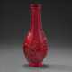 A CARVED RED GLASS BOTTLE VASE - photo 1