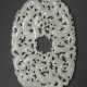 A FINELY CARVED WHITE JADE `NINE DRAGON` OVAL PLAQUE - фото 1