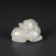 A SMALL WHITE JADE FIGURE OF A RECUMBENT MYTHICAL BEAST - фото 1