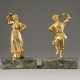 A PAIR OF BRONZE FIGURES SHOWING A DANCING PEASANT COUPL - фото 1
