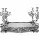 A CONTINENTAL SILVER-PLATED MIRROR PLATEAU CANDELABRUM - photo 1