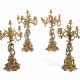 A SET OF FOUR NAPOLEON III GILT AND SILVERED-BRONZE SEVEN-LIGHT CANDELABRA - Foto 1