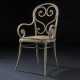 A GOLD AND SILVER-INLAID AND METAL-MOUNTED WALRUS IVORY ARMCHAIR - фото 1