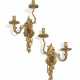 A PAIR OF REGENCE ORMOLU TWO-BRANCH WALL LIGHTS - photo 1