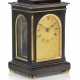 AN EARLY VICTORIAN EBONISED FRUITWOOD AND GILT-BRASS TIMEPIECE MANTEL CLOCK - photo 1