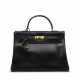 A BLACK CALF BOX LEATHER RETOURNÉ KELLY 35 WITH GOLD HARDWARE - фото 1