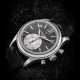 PATEK PHILIPPE. A PLATINUM AUTOMATIC ANNUAL CALENDAR FLYBACK CHRONOGRAPH WRISTWATCH WITH DAY/NIGHT INDICATION - photo 1