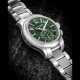 PATEK PHILIPPE. A STAINLESS STEEL AUTOMATIC ANNUAL CALENDAR FLYBACK CHRONOGRAPH WRISTWATCH WITH DAY/NIGHT INDICATOR, BRACELET AND GREEN DIAL - фото 1