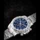 ROLEX. AN 18K WHITE GOLD AUTOMATIC CHRONOGRAPH WRISTWATCH WITH BRACELET AND BLUE DIAL - photo 1