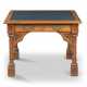 A MID-VICTORIAN GOTHIC-REVIVAL OAK WRITING-TABLE - Foto 1
