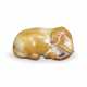 A YELLOW AND RUSSET JADE CARVING OF AN ELEPHANT - photo 1