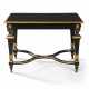 A FRENCH EBONISED AND PARCEL-GILT CENTRE TABLE - Foto 1