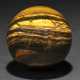 A LARGE SPHERE OF BANDED IRON TIGER EYE - Foto 1