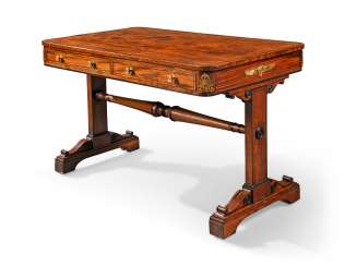 A REGENCY ORMOLU-MOUNTED MAHOGANY AND EBONISED DESK A REGENCY ORMOLU-MOUNTED MAHOGANY AND EBONISED DESK