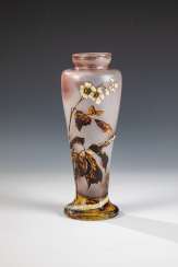 Vase with flowering BlackBerry branch Vase with flowering BlackBerry branch