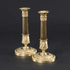 Pair of small bronze candlesticks Pair of small bronze candlesticks