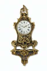 A LOUIS XV ORMOLU-MOUNTED POLYCHROME-DECORATED MUSICAL BRACK... A LOUIS XV ORMOLU-MOUNTED POLYCHROME-DECORATED MUSICAL BRACK...