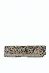 A GRAY SCHIST RELIEF WITH FOLIATE SCROLL A GRAY SCHIST RELIEF WITH FOLIATE SCROLL