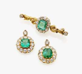 Brooch and a pair of earrings with emeralds and diamonds Brooch and a pair of earrings with emeralds and diamonds