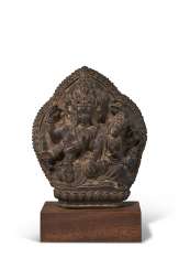 A BRONZE VOTIVE PLAQUE WITH MAHARAGAVAJRA MANJUSHRI AND CONS... A BRONZE VOTIVE PLAQUE WITH MAHARAGAVAJRA MANJUSHRI AND CONS...