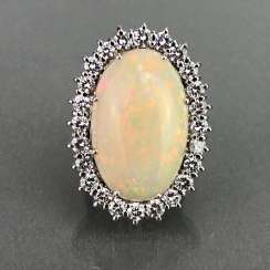 Fancy ladies ring with large Opal 25 carat and brilliant-cut diamonds of 2.5 carats. Gold 585 white. Fancy ladies ring with large Opal 25 carat and brilliant-cut diamonds of 2.5 carats. Gold 585 white.