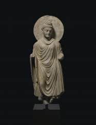 A GRAY SCHIST FIGURE OF BUDDHA SHAKYAMUNI A GRAY SCHIST FIGURE OF BUDDHA SHAKYAMUNI