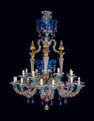 AN ITALIAN POLYCHROME COLOURED-GLASS TWENTY-LIGHT CHANDELIER AN ITALIAN POLYCHROME COLOURED-GLASS TWENTY-LIGHT CHANDELIER