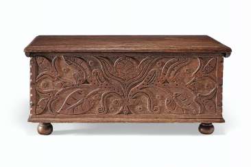 A CARVED AND PAINTED OAK BOX A CARVED AND PAINTED OAK BOX